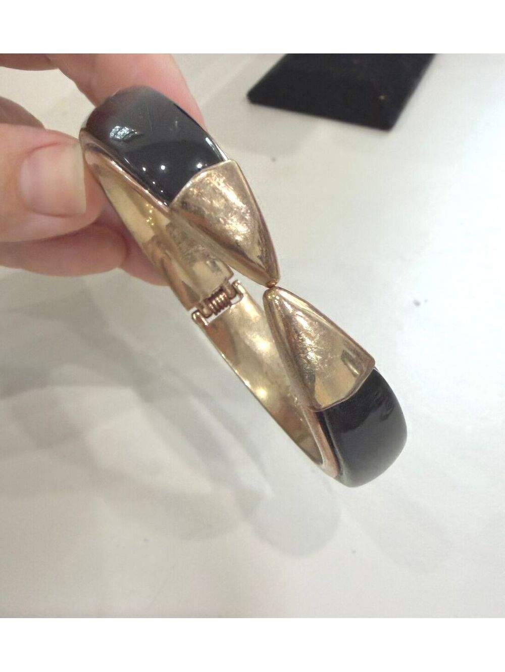 Armani Exchange Black and Gold Tone Hinged Bangle Bracelet